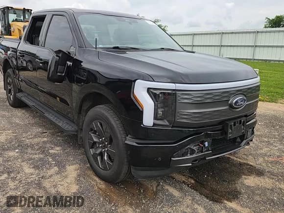 ✅ 2022 Ford F-150 Lightning Pro • VIN: 1FT6W1EV2NWG03104 • Лот: 65034965. Опубликован ранее на Copart с пробегом 124 442 миль. Бесплатный доступ к архиву аукционных продаж из США и подробный отчёт об истории автомобиля на DreamBid. Изображение 13.
