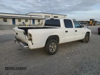 ✅ 2002 Dodge Dakota SLT • VIN: 1B7HL48X92S598972 • Lot: 79393614. Wystawiony na Copart z przebiegiem 228 582 mil. Bezpłatny archiwum sprzedaży aukcyjnych z USA i szczegółowy raport historii pojazdu na DreamBid. Zdjęcie 3.