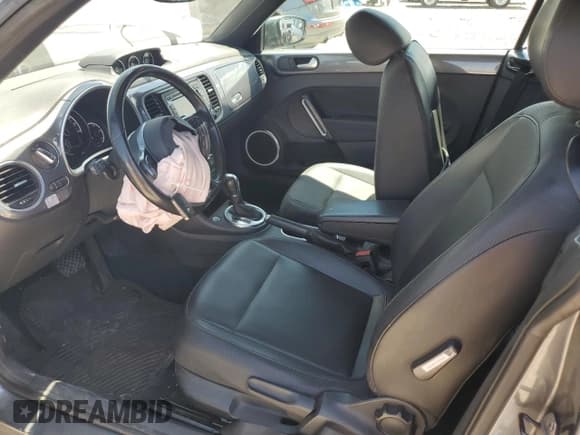 ✅ 2014 Volkswagen Beetle 2.0L TDI • VIN: 3VW5L7AT5EM819800 • Lot: 63522625. Listed on Copart with 81,641 mi. Free auction sales archive from the USA and detailed vehicle history report at DreamBid. Image 7.