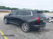 ✅ 2023 Cadillac XT6 FWD Premium Luxury • VIN: 1GYKPCRS6PZ106284 • Lot: 41595617. Listed on IAAI with 32,795 mi. Free auction sales archive from the USA and detailed vehicle history report at DreamBid. Image 3.