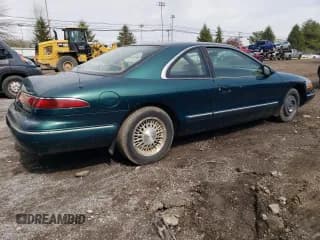 ✅ 1993 Lincoln Mark VIII • VIN: 1LNLM91V6PY718157 • Лот: 49493195. Опубликован ранее на Copart с пробегом 129 889 миль. Бесплатный доступ к архиву аукционных продаж из США и подробный отчёт об истории автомобиля на DreamBid. Изображение 3.