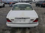 ✅ 1997 Jaguar XJ Vanden Plas • VIN: SAJKX6245VC805748 • Lot: 44275015. Wystawiony na Copart z przebiegiem 70 473 mil. Bezpłatny archiwum sprzedaży aukcyjnych z USA i szczegółowy raport historii pojazdu na DreamBid. Zdjęcie 6.