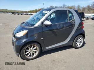 ✅ 2008 Smart fortwo Pure • VIN: WMEEJ31X88K148415 • Lot: 54895075. Wystawiony na Copart z przebiegiem 50 485 mil. Bezpłatny archiwum sprzedaży aukcyjnych z USA i szczegółowy raport historii pojazdu na DreamBid. Zdjęcie 1.