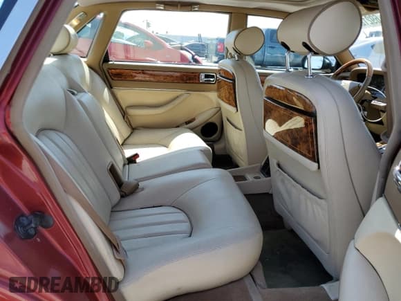 ✅ 1995 Jaguar XJ • VIN: SAJKX1744SC720830 • Lot: 69212295. Listed on Copart with 77,847 mi. Free auction sales archive from the USA and detailed vehicle history report at DreamBid. Image 10.