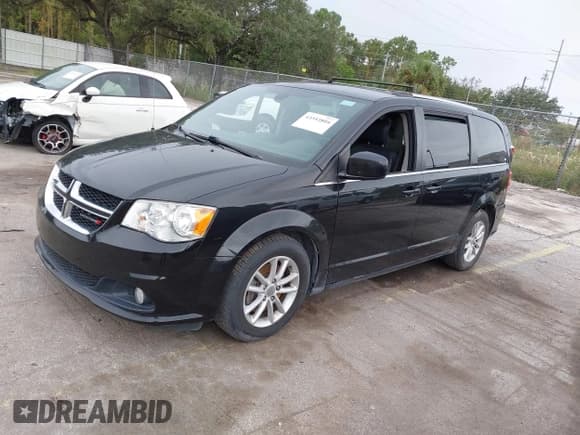 ✅ 2020 Dodge Grand Caravan SXT • VIN: 2C4RDGCG3LR180159 • Лот: 43353804. Опубликован ранее на IAAI с пробегом 117 521 миль. Бесплатный доступ к архиву аукционных продаж из США и подробный отчёт об истории автомобиля на DreamBid. Изображение 2.
