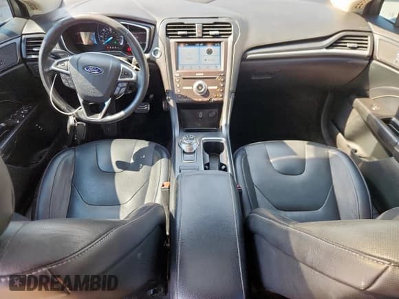 ✅ 2017 Ford Fusion Hybrid Titanium • VIN: 3FA6P0RU4HR188163 • Lot: 85920365. Wystawiony na Copart z przebiegiem 143 671 mil. Bezpłatny archiwum sprzedaży aukcyjnych z USA i szczegółowy raport historii pojazdu na DreamBid. Zdjęcie 8.