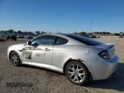 ✅ 2008 Hyundai Tiburon GT • VIN: KMHHN66F68U270322 • Лот: 85873875. Опубликован ранее на Copart с пробегом 181 595 миль. Бесплатный доступ к архиву аукционных продаж из США и подробный отчёт об истории автомобиля на DreamBid. Изображение 2.