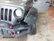 ✅ 2017 Jeep Wrangler Unlimited Rubicon Recon • VIN: 1C4BJWFG5HL687757 • Lot: 42367095. Listed on IAAI with 48,441 mi. Free auction sales archive from the USA and detailed vehicle history report at DreamBid. Image 6.