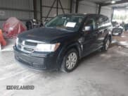 ✅ 2014 Dodge Journey SE • VIN: 3C4PDCAB7ET281275 • Lot: 43876619. Listed on IAAI with 129,908 mi. Free auction sales archive from the USA and detailed vehicle history report at DreamBid. Image 2.