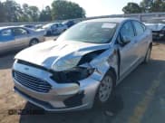 ✅ 2019 Ford Fusion S • VIN: 3FA6P0G70KR160235 • Лот: 43280903. Опубликован ранее на IAAI с пробегом 103 312 миль. Бесплатный доступ к архиву аукционных продаж из США и подробный отчёт об истории автомобиля на DreamBid. Изображение 6.