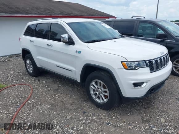✅ 2019 Jeep Grand Cherokee Laredo E • VIN: 1C4RJFAG0KC527864 • Lot: 42652419. Listed on IAAI with 115,282 mi. Free auction sales archive from the USA and detailed vehicle history report at DreamBid. Image 1.