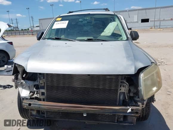 2010 Mercury Mariner z VIN 4M2CN8B75AKJ13322, wystawiony jako IAAI lot #42832064 z przebiegiem 205 074 mil mil oraz . Historia ofert i sprzedaży dostępna na DreamBid. Obrazek 13.