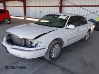 ✅ 2000 Lincoln Continental • VIN: 1LNHM97V9YY821894 • Lot: 41657199. Wystawiony na IAAI z przebiegiem 218 330 mil. Bezpłatny archiwum sprzedaży aukcyjnych z USA i szczegółowy raport historii pojazdu na DreamBid. Zdjęcie 2.