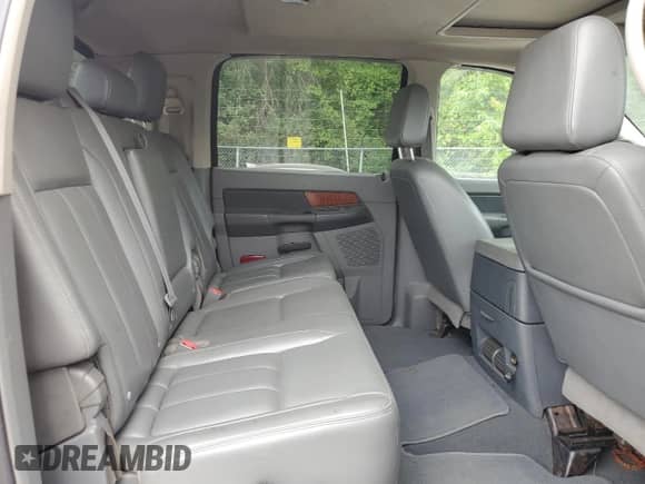 2007 Dodge 3500 Laramie z VIN 3D7MX39A47G801021, wystawiony jako Copart lot #69497085 z przebiegiem 163 637 mil mil oraz Czysty tytuł • Clean title. Historia ofert i sprzedaży dostępna na DreamBid. Obrazek 10.