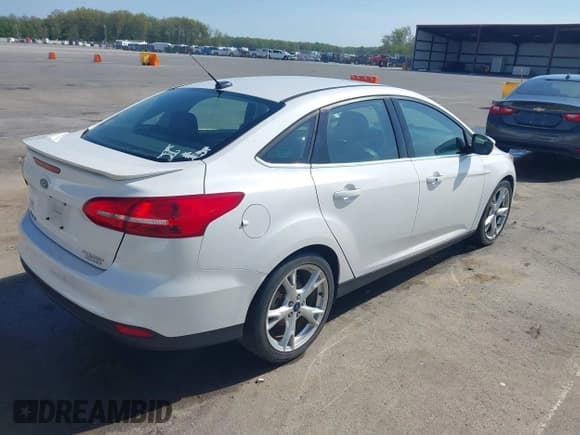 ✅ 2016 Ford Focus Titanium • VIN: 1FADP3J23GL358772 • Лот: 42103694. Опубликован ранее на IAAI с пробегом 85 290 миль. Бесплатный доступ к архиву аукционных продаж из США и подробный отчёт об истории автомобиля на DreamBid. Изображение 4.