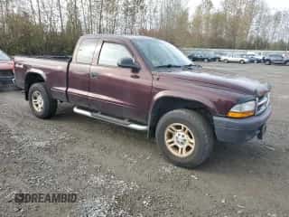 2004 Dodge Dakota z VIN 1D7HG12K04S691646, wystawiony jako Copart lot #73257544 z przebiegiem 104 753 mil mil oraz Czysty tytuł • Clean title. Historia ofert i sprzedaży dostępna na DreamBid. Obrazek 4.