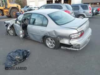 2000 Chevrolet Malibu LS z VIN 1G1NE52J6Y6164901, wystawiony jako IAAI lot #41383022 z przebiegiem 47 334 mil mil oraz . Historia ofert i sprzedaży dostępna na DreamBid. Obrazek 3.