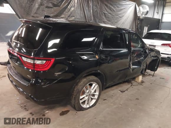 ✅ 2022 Dodge Durango R/T • VIN: 1C4SDHCT2NC224281 • Lot: 41232204. Listed on IAAI with 50,748 mi. Free auction sales archive from the USA and detailed vehicle history report at DreamBid. Image 4.
