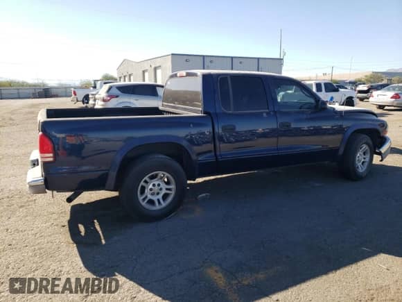 2004 Dodge Dakota SLT z VIN 1D7HL48N44S500485, wystawiony jako Copart lot #73153244 z przebiegiem Nie podano mil oraz Szkoda całkowita • Salvage title. Historia ofert i sprzedaży dostępna na DreamBid. Obrazek 3.