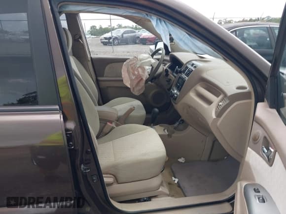 ✅ 2005 Kia Sportage LX • VIN: KNDJF723957075412 • Lot: 42382427. Listed on IAAI with 117,612 mi. Free auction sales archive from the USA and detailed vehicle history report at DreamBid. Image 5.