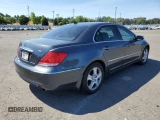 ✅ 2005 Acura RL • VIN: JH4KB16535C013289 • Лот: 68360424. Опубликован ранее на Copart с пробегом 128 315 миль. Бесплатный доступ к архиву аукционных продаж из США и подробный отчёт об истории автомобиля на DreamBid. Изображение 3.