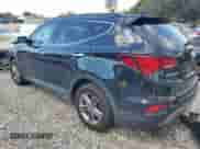2017 Hyundai Santa Fe 2.4L z VIN 5NMZU3LB2HH041686, wystawiony jako Copart lot #84218665 z przebiegiem 146 906 mil mil oraz Czysty tytuł • Clean title. Historia ofert i sprzedaży dostępna na DreamBid. Obrazek 2.