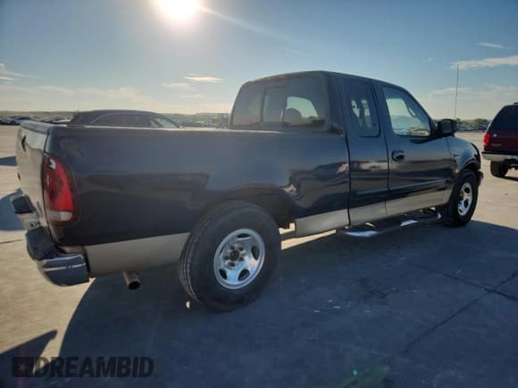 ✅ 1999 Ford F-150 • VIN: 1FTRX17W4XNB72337 • Lot: 86766575. Listed on Copart with 183,712 mi. Free auction sales archive from the USA and detailed vehicle history report at DreamBid. Image 3.
