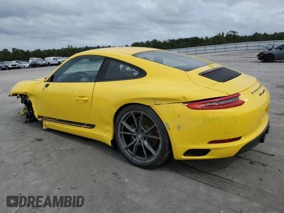 ✅ 2018 Porsche 911 Carrera • VIN: WP0AA2A90JS105864 • Лот: 71580364. Опубликован ранее на Copart с пробегом 9 065 миль. Бесплатный доступ к архиву аукционных продаж из США и подробный отчёт об истории автомобиля на DreamBid. Изображение 2.