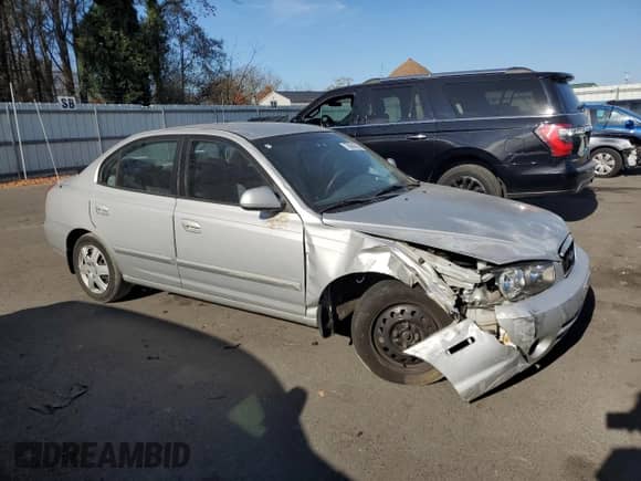 2001 Hyundai Elantra GLS z VIN KMHDN45D71U057338, wystawiony jako Copart lot #79084024 z przebiegiem 137 887 mil mil oraz Szkoda całkowita • Salvage title. Historia ofert i sprzedaży dostępna na DreamBid. Obrazek 4.