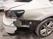 ✅ 2014 Volkswagen CC Executive • VIN: WVWRP7AN9EE519502 • Lot: 41458158. Listed on IAAI with 85,988 mi. Free auction sales archive from the USA and detailed vehicle history report at DreamBid. Image 12.