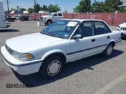 ✅ 1991 Toyota Corolla • VIN: 1NXAE94A1MZ237958 • Lot: 42666569. Listed on IAAI with 140,448 mi. Free auction sales archive from the USA and detailed vehicle history report at DreamBid. Image 2.