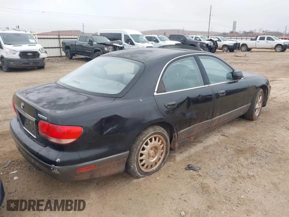 ✅ 2001 Mazda Millenia • VIN: JM1TA221711710228 • Lot: 41435837. Listed on IAAI with 152,445 mi. Free auction sales archive from the USA and detailed vehicle history report at DreamBid. Image 4.