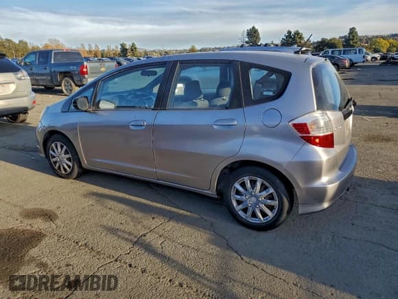 ✅ 2009 Honda Fit • VIN: JHMGE88219S055609 • Lot: 95073365. Listed on Copart with 185,948 mi. Free auction sales archive from the USA and detailed vehicle history report at DreamBid. Image 2.