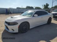 ✅ 2022 Dodge Charger R/T • VIN: 2C3CDXCT0NH157678 • Lot: 80244775. Listed on Copart with 80,305 mi. Free auction sales archive from the USA and detailed vehicle history report at DreamBid. Image 1.