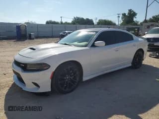 ✅ 2022 Dodge Charger R/T • VIN: 2C3CDXCT0NH157678 • Lot: 80244775. Listed on Copart with 80,305 mi. Free auction sales archive from the USA and detailed vehicle history report at DreamBid. Image 1.