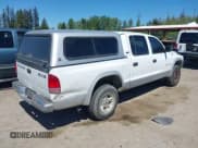 ✅ 2000 Dodge Dakota Sport • VIN: 1B7GG2AN9YS792231 • Lot: 42174764. Wystawiony na IAAI z przebiegiem 285 535 mil. Bezpłatny archiwum sprzedaży aukcyjnych z USA i szczegółowy raport historii pojazdu na DreamBid. Zdjęcie 4.