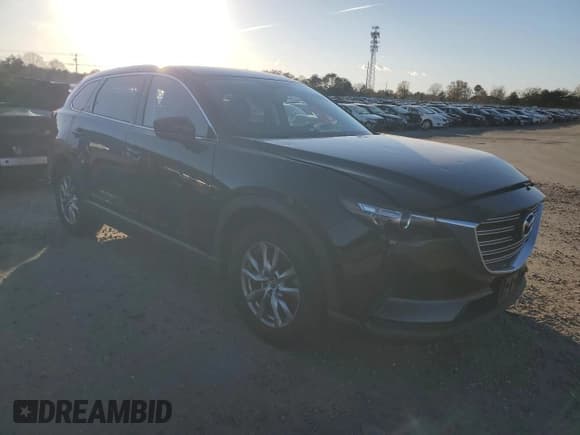 ✅ 2016 Mazda CX-9 Touring • VIN: JM3TCBCY4G0112481 • Lot: 92323225. Listed on Copart with 97,627 mi. Free auction sales archive from the USA and detailed vehicle history report at DreamBid. Image 4.