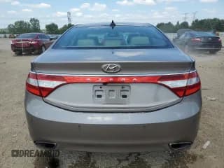 ✅ 2013 Hyundai Azera • VIN: KMHFH4JG7DA322989 • Лот: 68835005. Опубликован ранее на Copart с пробегом 110 946 миль. Бесплатный доступ к архиву аукционных продаж из США и подробный отчёт об истории автомобиля на DreamBid. Изображение 6.