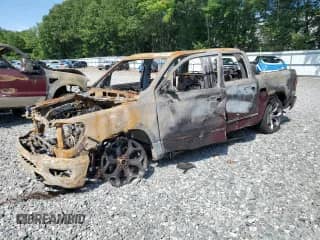 2019 Ram 1500 Limited z VIN 1C6SRFHT7KN549594, wystawiony jako Copart lot #63069755 z przebiegiem Nie podano mil oraz Szkoda całkowita • Salvage title. Historia ofert i sprzedaży dostępna na DreamBid. Obrazek 1.