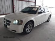 ✅ 2006 Dodge Magnum • VIN: 2D8FV47T66H349463 • Lot: 43886813. Listed on IAAI with 139,384 mi. Free auction sales archive from the USA and detailed vehicle history report at DreamBid. Image 2.