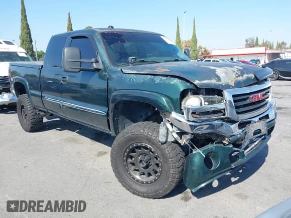 ✅ 2005 GMC Sierra 1500 SLE • VIN: 1GTEK19B55E214552 • Lot: 43475923. Listed on IAAI with 188,902 mi. Free auction sales archive from the USA and detailed vehicle history report at DreamBid. Image 1.