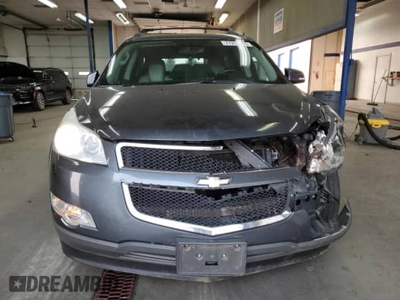 2012 Chevrolet Traverse LTZ с VIN 1GNKVLED0CJ351584, выставлен на аукционе Copart как лот 71313495 с пробегом 114 390 миль миль и Списание • Salvage title. История ставок и продаж доступна на DreamBid. Изображение 5.