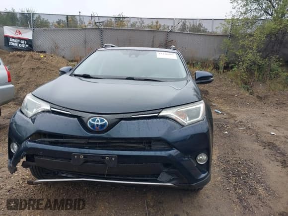 ✅ 2018 Toyota RAV4 Hybrid XLE • VIN: JTMRJREV0JD241600 • Lot: 43426297. Listed on IAAI with 63,794 mi. Free auction sales archive from the USA and detailed vehicle history report at DreamBid. Image 12.