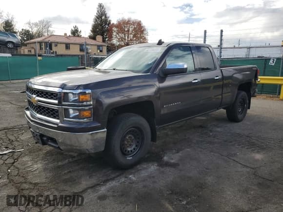 ✅ 2015 Chevrolet Silverado 1500 LS • VIN: 1GCVKPEC9FZ425569 • Lot: 82728495. Listed on Copart with 130,196 mi. Free auction sales archive from the USA and detailed vehicle history report at DreamBid. Image 1.