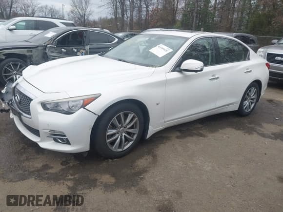 ✅ 2014 Infiniti Q50 Premium • VIN: JN1BV7AR7EM692504 • Lot: 43789438. Listed on IAAI with 104,772 mi. Free auction sales archive from the USA and detailed vehicle history report at DreamBid. Image 2.