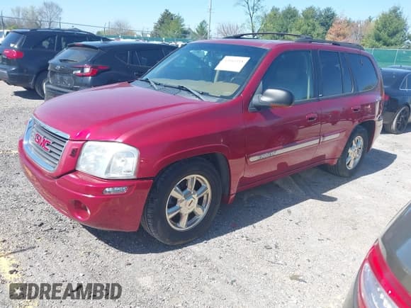 ✅ 2002 GMC Envoy SLT • VIN: 1GKDS13S922205147 • Lot: 42041118. Listed on IAAI with 127,400 mi. Free auction sales archive from the USA and detailed vehicle history report at DreamBid. Image 2.