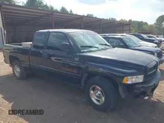 ✅ 1999 Dodge 1500 • VIN: 3B7HC13Y7XG165325 • Lot: 43157754. Listed on IAAI with 357,410 mi. Free auction sales archive from the USA and detailed vehicle history report at DreamBid. Image 1.