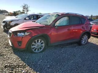 ✅ 2015 Mazda CX-5 Grand Touring • VIN: JM3KE2DY2F0519556 • Lot: 90306065. Wystawiony na Copart z przebiegiem 102 889 mil. Bezpłatny archiwum sprzedaży aukcyjnych z USA i szczegółowy raport historii pojazdu na DreamBid. Zdjęcie 1.
