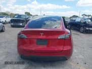 ✅ 2024 Tesla Model Y • VIN: 7SAYGDED7RF045410 • Лот: 42000700. Опубликован ранее на IAAI с пробегом 13 021 миль. Бесплатный доступ к архиву аукционных продаж из США и подробный отчёт об истории автомобиля на DreamBid. Изображение 17.