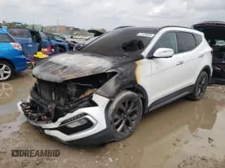 ✅ 2018 Hyundai Santa Fe Ultimate • VIN: 5NMZWDLA4JH103702 • Лот: 51429693. Опубликован ранее на Copart с пробегом Не указан. Бесплатный доступ к архиву аукционных продаж из США и подробный отчёт об истории автомобиля на DreamBid. Изображение 1.
